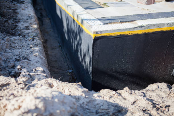 Professional Waterproofing technician working in Elmhurst, IL